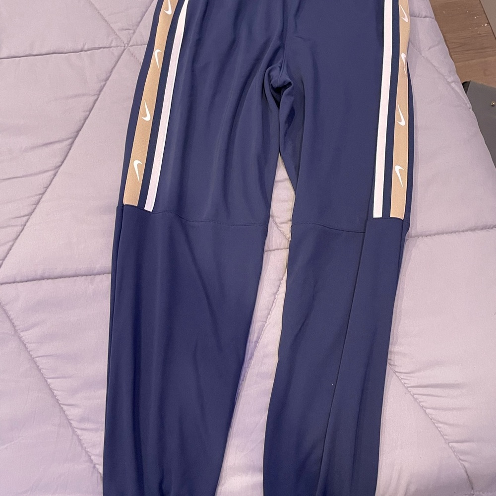 Nike Blue Track Pants with Beige and White Stripes